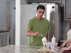 Kelly Caprice is just getting things ready for a dessert when her stepson's girlfriend, Natalie Brooks walks in. The two girls watch as Diego joins them and proceeds to eat ice cream like a slob. When Diego leaves the room, Kelly tells Natalie that she fears Diego doesn't know how to eat pussy properly. Natalie admits Kelly is correct, but Kelly knows how to help her stepson learn.When Diego gets called in for dessert, he finds Kelly standing besides Natalie, who has ice cream on her pussy. Under Kelly's watchful gaze, Diego licks Natalie's pussy. Kelly keeps an eye on Diego even as she begins making out with Natalie and then moves down to lap Natalie's tits. Then Kelly replaces Natalie on the table so Diego can eat her cooch. In return, the girls move things to the living room and work together to blow Diego's hardon.Next, Kelly insists on watching and masturbating as Natalie demonstrates her stiffie riding skills in reverse cowgirl. Kelly takes a turn in cowgirl as Natalie watches and diddles herself. Getting on her knees, Natalie takes a doggy style pussy pounding as Kelly instructs her in a pussy feast. As the threesome winds down, Kelly has one last lesson for both Diego and Natalie. She gets on her back and shows them how to properly take a creampie.