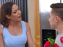 This season on Dating my Stepson, we're taking a new twist. The guys are looking for love, but they need to date the potential girlfriend's mom first. If it works out, he'll date the daughter right on the spot. Today's date is Juan Loco trying to impress Cassie Del Isla, mom to Tiffany.Cassie has prepared a date where Juan will learn how to treat a lady. She shows him how to arrange roses, how to make chocolate dipped strawberries, and how to write a haiku. Cassie can tell Juan is checking her out, and she finds that she likes it. By the time they get to the haiku, they can't seem to keep their mouths off each other. After a brief makeout, Cassie peels off her dress to unveil a stunning body with hot lingerie and Juan goes in for a pussy feast. In return, he gets his dick and balls sucked.Getting to her feet, Cassie leans forward over the kitchen island so Juan can do her from behind. Juan takes his turn on the counter so Cassie can mount him in cowgirl and ride him until she's arching her back in delight. Climbing off, she gets on her back so Juan can keep their party going. He gives Cassie one last big O, then cums on her stomach. Although Cassie gives her blessing to Juan, Juan thinks he'll keep looking for another milf.